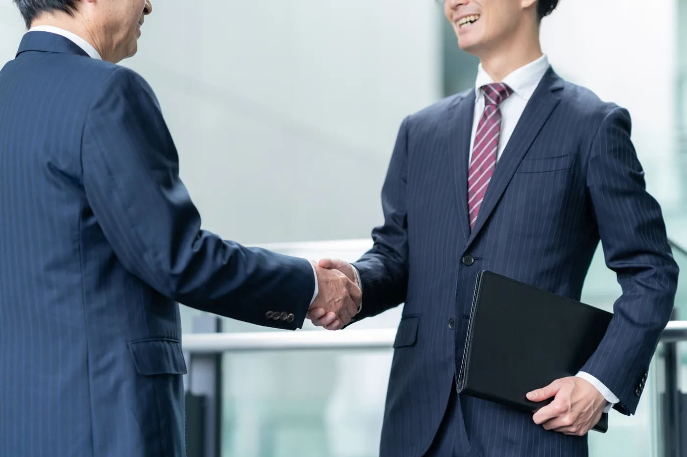 Two people shaking hands